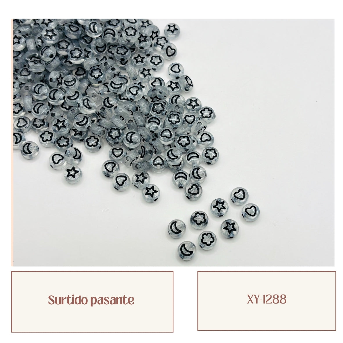 Pasantes transparentes con símbolos negros surtido luna estrella corazón flor