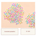 Corazones pasantes blancos con corazones de colores